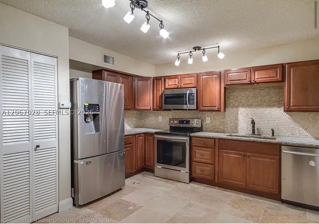 Photo of 233 SE 11th Ave #233, Pompano Beach, FL 33060 (MLS # A12067028)