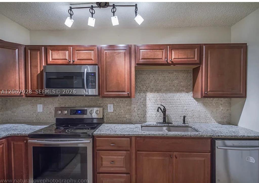 Photo of 233 SE 11th Ave #233, Pompano Beach, FL 33060 (MLS # A12067028)