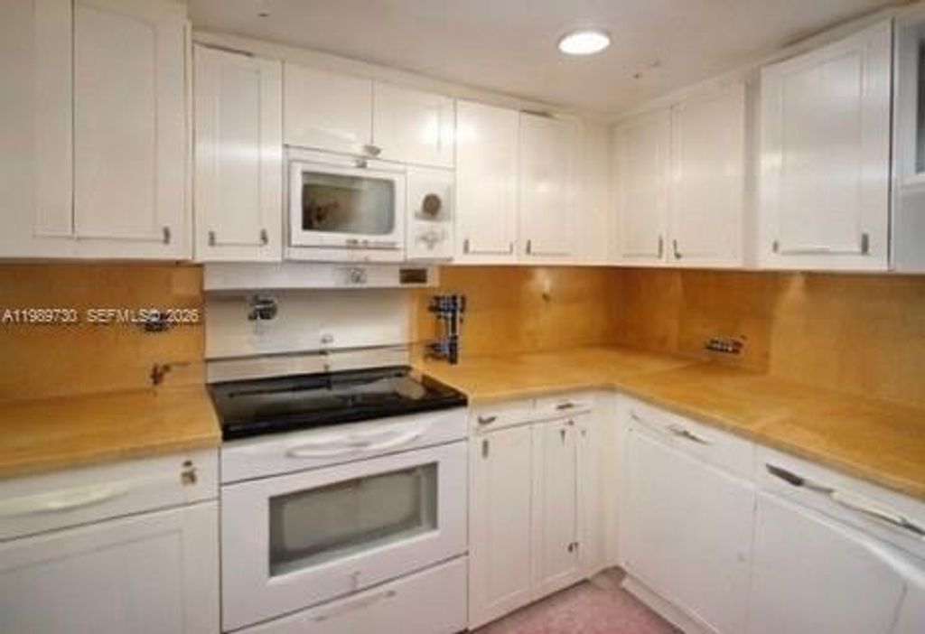 Photo of 3531 Inverrary Dr #310, Lauderhill, FL 33319 (MLS # A11989730)