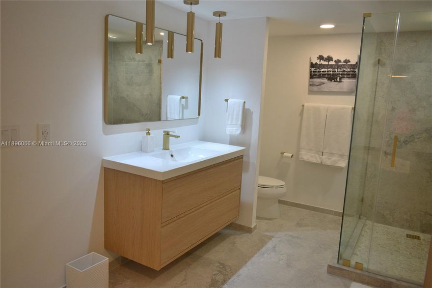 Rarely available bright and oversized residence, experience unparalleled luxury in this fully renovated condo, open-concept layout, decorated fully furnished and equipped, featuring designer kitchen with matching quartz countertops/backsplash, custom cabinetry, and premium stainless steel  appliances. Imported porcelain tile floors from Spain, 2 full bathrooms, tile from Italy, free standing bathtub, custom walk in closets, large private balcony overlooking the Atlantic Ocean with views from every room. resort-style pool area. It is ready for your perfect beachfront stay. Enjoy abundant custom closets. Rent includes internet, cable, and water—just bring your toothbrush. 30 minutes to Miami.