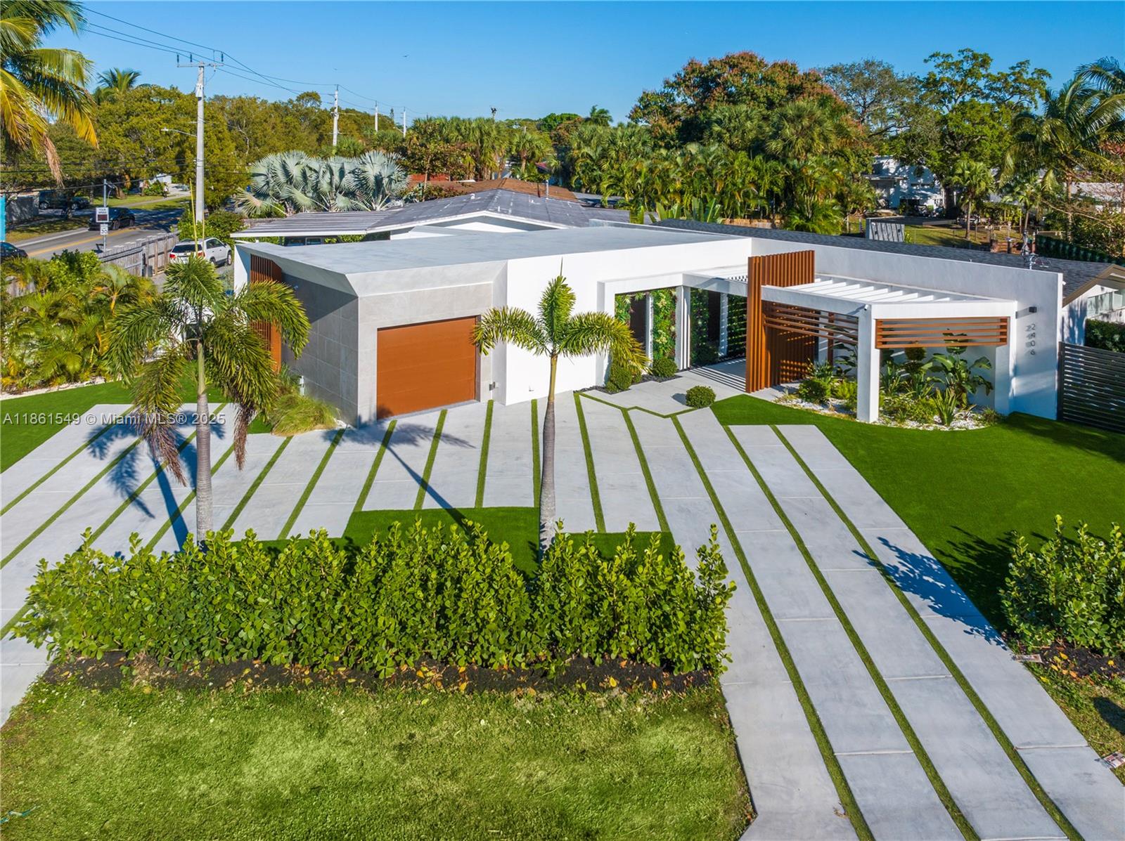 Welcome to a modern 3BD/2.5BA waterfront masterpiece in Lauderdale Isles. This home features floor-to-ceiling windows, marble waterfall countertops, and unique designer accents. The primary suite offers a spa-inspired bath with walk-in shower and soaking tub. Entertain outdoors with a spacious deck, built-in BBQ, sink, and fireplace overlooking the water. Enjoy a private dock with direct ocean access and no fixed bridges—a boater’s dream. With a 1-car garage and prime location just minutes from Las Olas, beaches, Hard Rock Casino, Sawgrass Mills, I-95 & Turnpike, this property combines luxury, convenience, and the ultimate South Florida lifestyle.