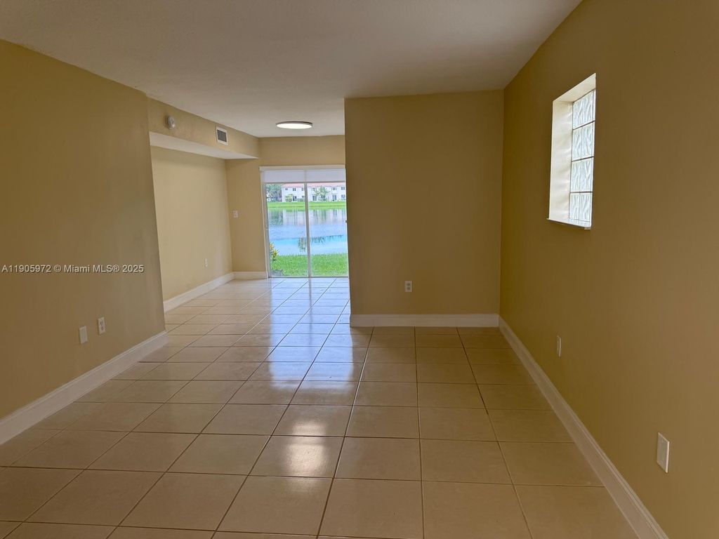 Photo of 1261 SE 31st Ct #106-53, Homestead, FL 33035 (MLS # A11905972)