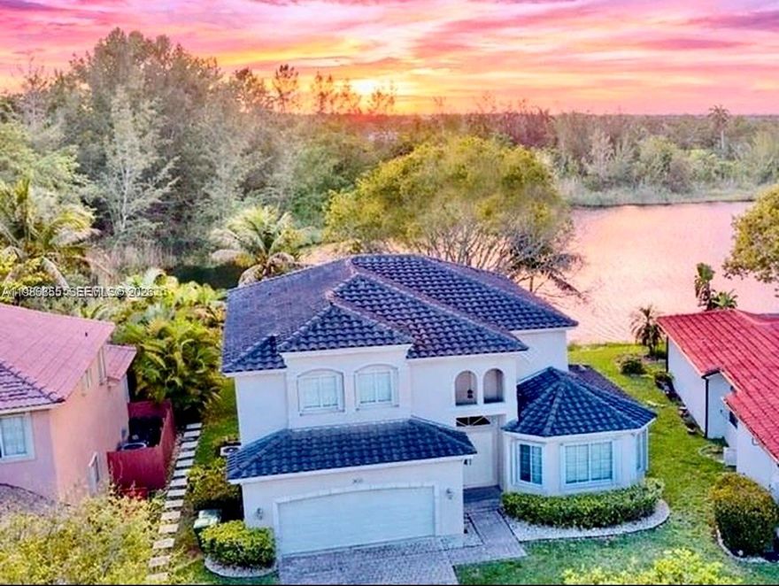 Wake up to peaceful lake views and unwind each evening with breathtaking sunsets right from your own backyard in the gated community of Keys Landing. 
This spacious two-story home is designed for both connection and comfort, offering 4 bedrooms, 3.5 bathrooms, and a versatile den or office; perfect for growing families, remote work, or creating the space you’ve always wanted.
Upstairs, the expansive primary suite becomes your private retreat, complete with generous his-and-her walk-in closets and room to truly relax at the end of the day. 
Downstairs, a full bedroom and bathroom provide the ideal setup for guests, in-laws, or even a quiet home office tucked away from the main living areas.
Step outside and imagine weekend barbecues, kids playing safely in the cul-de-sac, or simply enjoying the calm of the water and nature preserve views that make this home feel like an everyday escape.
With a newer roof (2022), accordion shutters for added protection, a modern security system, and fiber optic internet, you’ll enjoy both peace of mind and modern convenience.
Perfectly positioned near the Homestead-Miami Speedway, Homestead Air Reserve Base, the $280M Sports Hub that just broke ground and a variety of shopping and dining options, this home offers the balance of tranquility and accessibility that today’s buyers are searching for.
This isn’t just a home, it’s where your next chapter begins.