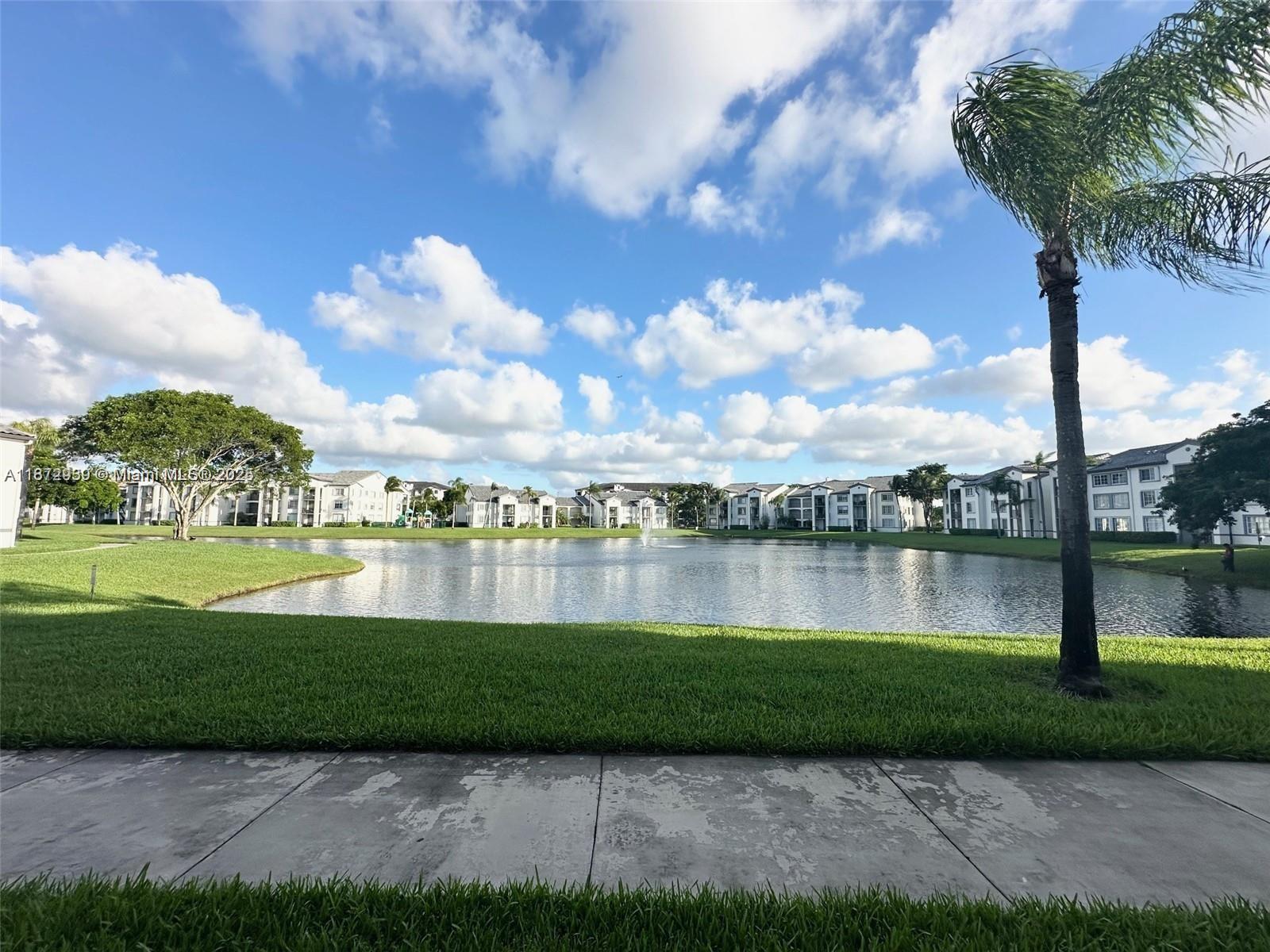 Spacious 2-bedroom, 1-bathroom apartment for rent, featuring ceramic tile flooring throughout. This first-floor unit offers beautiful lake views and is located on 107th Avenue, just one block away from a variety of restaurants and shops, in the heart of Doral, close to top-rated schools and major highways. The community offers excellent amenities, including a swimming pool, fitness center, and tennis court.