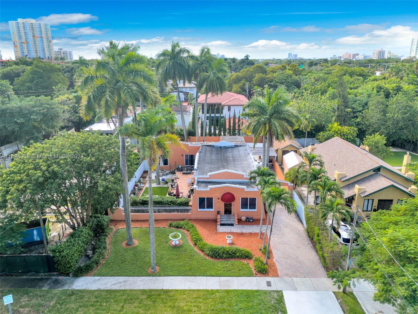 Rare opportunity to own a highly sought after Roads home on an oversized lot steps from historic South Miami Ave. Privileged location, steps from Brickell and the financial Center of Miami, walking distance from "Simpson and Alice Wainwright Park". This 1925 home features an inviting brick paved driveway with room for covered RV/boat parking and serene courtyard with room for a pool. Step into this light filled residence featuring 3bed 2bath in the main home that also includes pristine Dade County pine flooring, 2 bonus rooms ideal for a den/study, renovated kitchen, jack and jill bathroom and more. Also includes an attached private studio with full bathroom, perfect for a maid/in-law quarter area. Don't miss out on this incredible opportunity in one of Miami's most desirable neighborhoods
