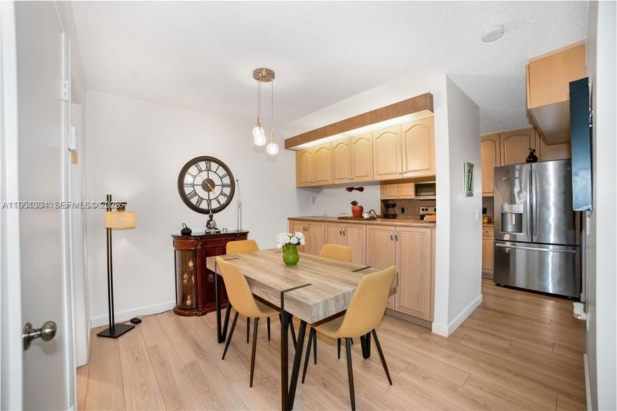 ONE OF THE MOST GORGEOUS 3/2.5 townhomes. In one of the most desirable communities in Davie FL. Updated chefs' kitchen with spacious countertops & Stainless-steel Appliances. LVP throughout the home. Primary bedroom has two closets with floor to ceiling mirror doors, double sink vanity in the master bathroom. New ROOF, Gutters and new washer & dryer. Large screened in patio. Walking distance to Shopping located in A+ School district. Close to all major highways and Airport. HOA includes membership to the Country Club at Pine Island Ridge, which offers two restaurants, gym, spa, heated pool, access to the golf course, tennis/pickleball courts, bbq area and many other amenities. Be part of this great community and enjoy the country club lifestyle!