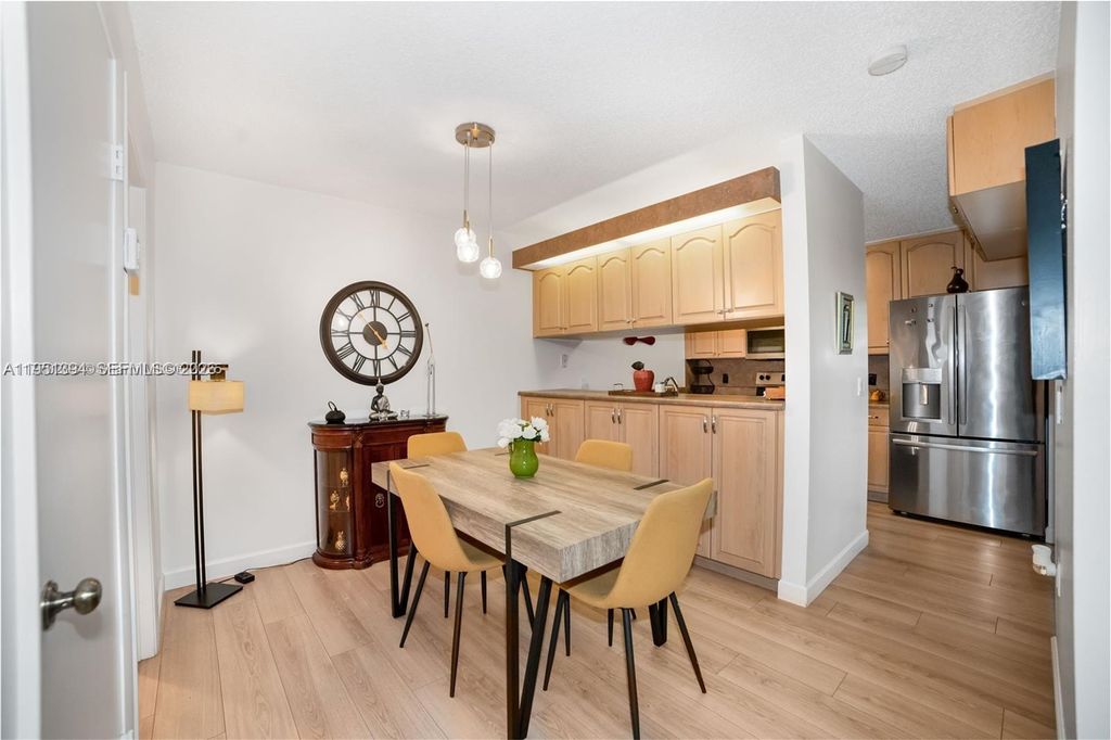 Photo of 9135 SW 20th Pl #D, Davie, FL 33324 (MLS # A11951394)