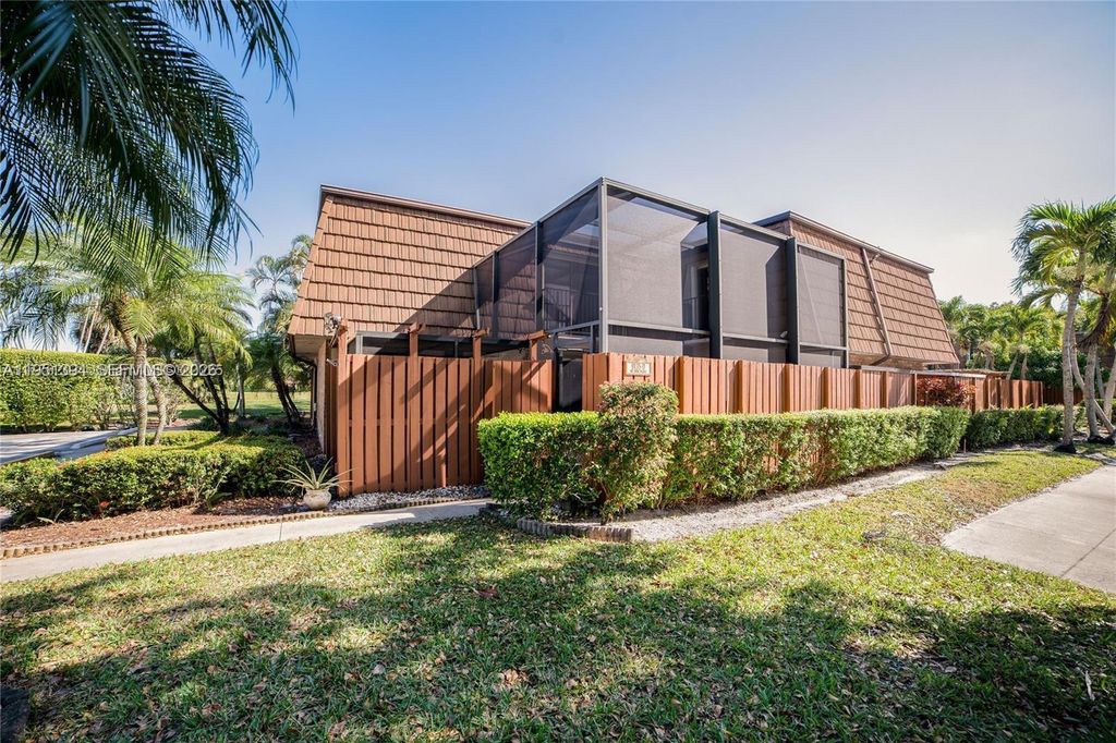 Photo of 9135 SW 20th Pl #D, Davie, FL 33324 (MLS # A11951394)