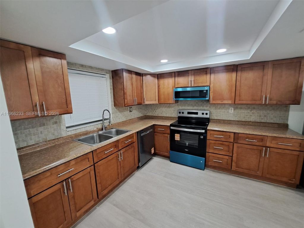 Photo of 5100 SW 90th Ave #208, Cooper City, FL 33328 (MLS # A11966233)