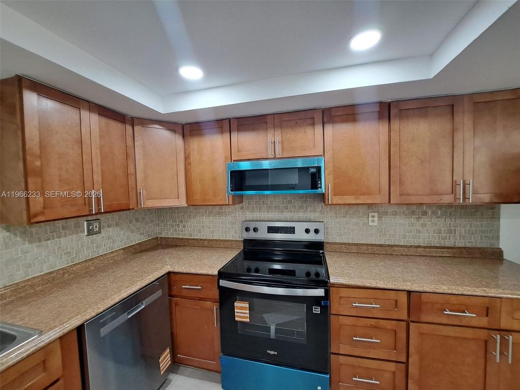 Photo of 5100 SW 90th Ave #208, Cooper City, FL 33328 (MLS # A11966233)