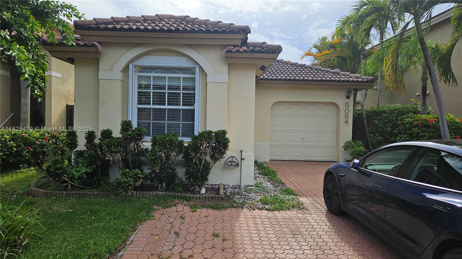 Impeccably maintained 3-bed, 2-bath home in desirable Doral Landings. Minor renovations make it ideal for buyers ready to personalize or investors seeking immediate rental income. Enjoy a spacious layout and fully paved patio perfect for outdoor gatherings and low-maintenance living. Located in a gated community near top-rated schools, shopping, dining, and major expressways. Community amenities include a pool, playground, and 24/7 security. Pet-friendly with lush landscaping for added charm. Just minutes from Dolphin Mall, Miami International Airport, and major entertainment spots. A move-in-ready gem offering comfort, location, and investment value in one unbeatable package.