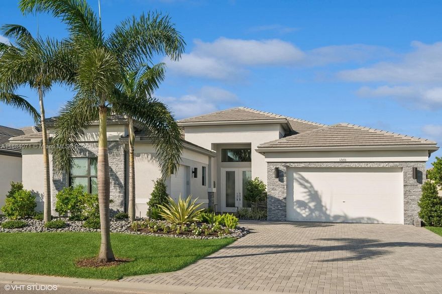 This modern Florida contemporary redefines luxury for today’s discerning buyer. Situated on a lake front within Valencia Walk, the home captures waterfront and sunset views,3 bedroom 4 bath pool home with outdoor fully screened lanai, water feature and summer kitchen. The expansive entertaining space of this thoughtfully designed home boasts 3 privately placed en-suites, chef’s kitchen with top-of-the-line appliances, custom cabinetry and fitted butler’s pantry. Highlights include large format tile throughout with designer wool carpet in the guest suites. 48” Wolf dual-fuel gourmet range, 60” sub-zero column Ref/Frz and 4 wine-beverage centers throughout.  The gourmet outdoor kitchen includes a built in gas grill/rotisserie and a second dishwasher.