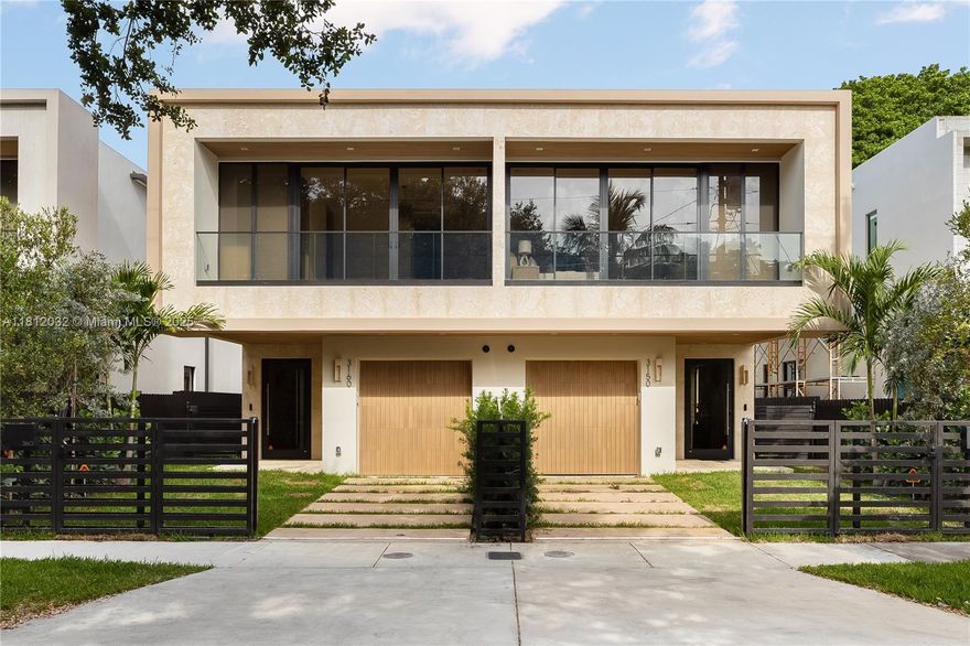 Built by experienced local builder, this 4BD/3.5BA designer-selected townhome in Coconut Grove combines thoughtful design with quality finishes. 

Natural coral stone lines the exterior facade. The home features 10-ft ceilings, solid 8-ft Italian wood doors, and porcelain flooring sourced from Spain and Italy. The layout is open and filled with natural light, with warm, neutral tones that create a welcoming, modern feel. The kitchen is outfitted with MandiCasa Italian cabinetry, Cosentino countertops, and a full Thermador appliance package. Pre-wired with Ubiquiti hardware for high-speed internet, security, and cameras. Private backyard with turf, pool, and space to entertain. 

Gated entry, garage, and just minutes from parks, schools, and dining.