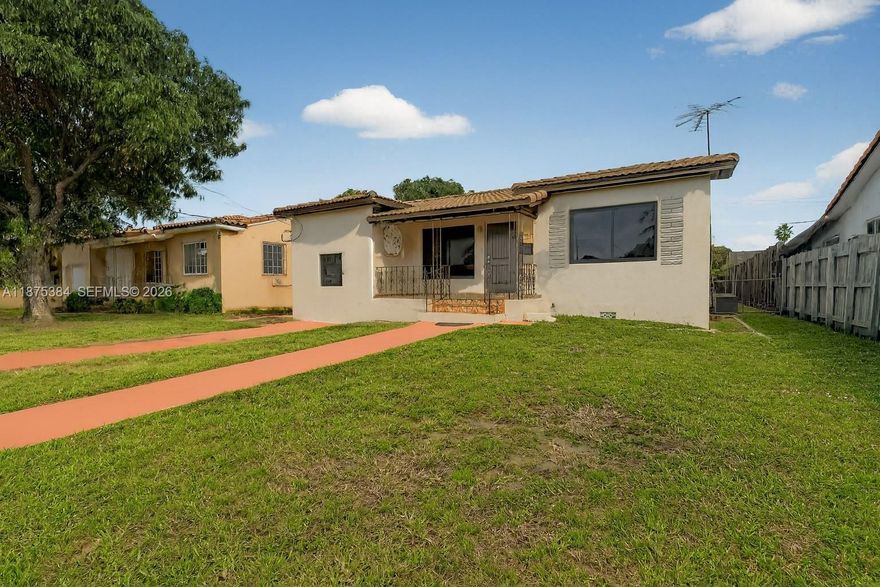 Renovated Starter Home w/ brand new vinyl floors & paint, brand new modern white kitchen w/ stainless steel appliances. Bright Floor plan w/ lots of windows. Mostly PVC & Copper Plumbing. NEW IMPACT WINDOWS INSTALLED NOV 20/25. APPLIANCES in process of installation included in the price. Large screened patio.  Roof 10-11 years. AC 2022. Centrally located in Miami, just 15 mins from Coconut Grove, Brickell, Coral Gables, Merrick Park, close to parks, schools. Large backyard with extra concrete storage room. Plenty of Room for RV or boat. NO HOA great for investors, FHA/VA/CONV financing okay.  Huge Backyard to make it a paradise or add a pool and pergola for enjoying the outdoors. 3rd bedroom is a large room from converted garage, perfect for in law quarters, or convert back to a 1 car garage.