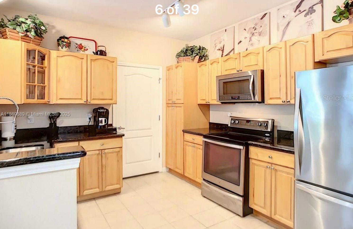 Welcome to this gorgeous 3 Bedroom 2 Bath Fully-Furnished Luxury Condo on the 1st floor, in the desired gated community of Cane Island. Spacious in size, with and Open floor plan, split bedrooms, and all Upgraded; Kitchen & bathrooms are upgraded & feature granite counter-tops. This condo building is just walking distance to the Clubhouse where you can enjoy all the amenities it has to offer (fitness Center, Resort style heated swimming pool and spa, Game room, and so much more). It's resort living at it's Best. Brand new A/C Unit, wasjer and dryer inside the unit! HOA fees include Cable TV, Internet and Water. Schedule your showing Today!