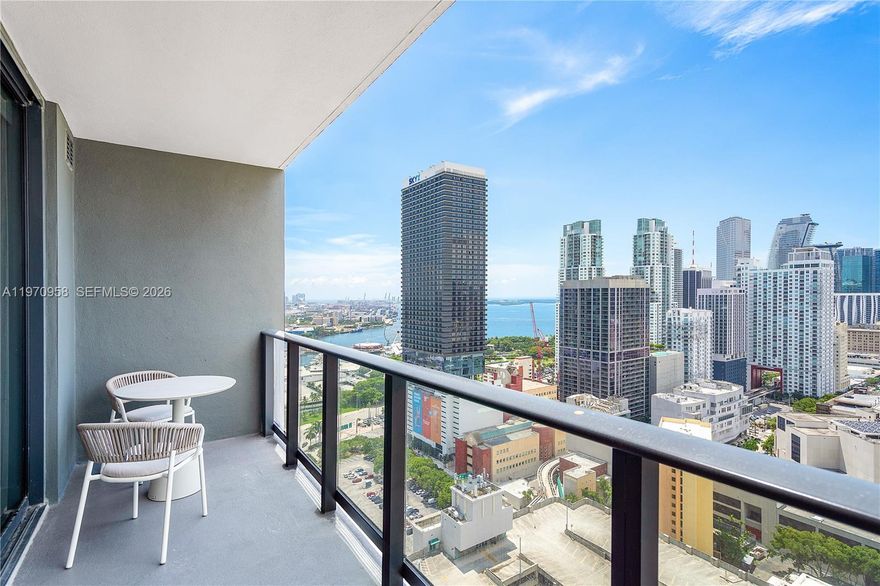 Enjoy modern Downtown Miami living in this beautifully turnkey furnished 1-bedroom apartment with stunning city and bay views. Located on a high floor, the residence offers a bright open layout with floor-to-ceiling windows that fill the space with natural light and showcase the surrounding skyline. The apartment comes furnished with tasteful, contemporary finishes throughout. The kitchen is well equipped with modern appliances and ample storage, ideal for everyday living. The bedroom provides a comfortable retreat featuring a king size bed, while the stylish bathroom features clean, modern design. Residents have access to premium amenities including a rooftop pool with panoramic views, a fully equipped fitness center, valet parking, and 24/7 concierge services. Situated in the heart of Downtown Miami, the location offers easy access to dining, shopping, entertainment, and the waterfront—perfect for enjoying everything the city has to offer. Move-in ready and designed for comfort, convenience, and urban living.