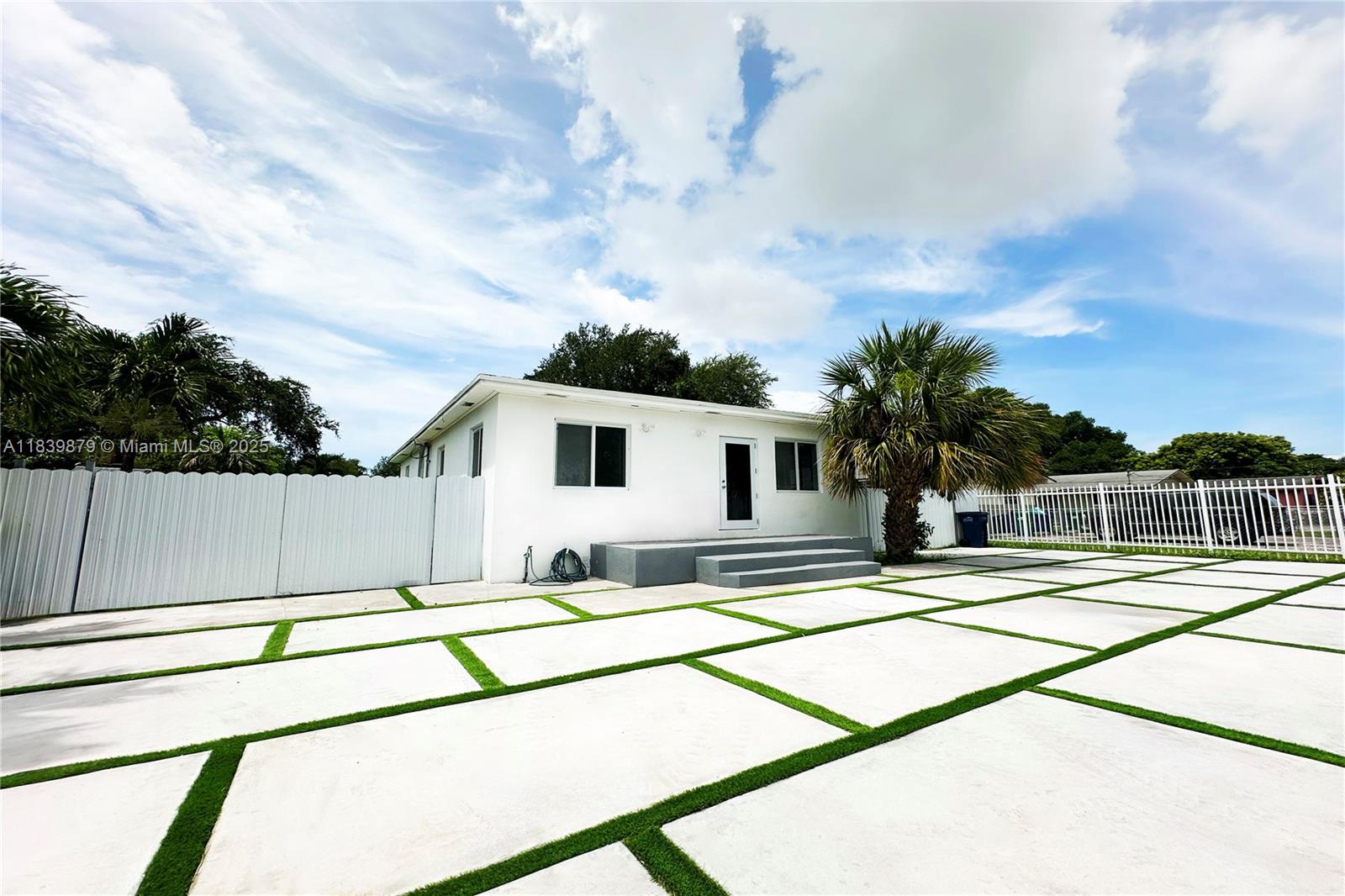 LARGER THAN TAX ROLL - $10,000 CREDIT TO BUYER TORWARD CLOSING COST! This beautifully updated home features a brand-new roof, impact windows, modern floors, a stylish kitchen, and a fully upgraded bathroom. Includes a detached, fully renovated efficiency—perfect for guests or income. Enjoy new central A/C, a large fenced yard, modern driveway, and two gated entrances ideal for RV or boat access. Massive 9,952 SqFt lot offers space to add a pool. Located in a central Miami neighborhood close to major roads, shopping, and more. Professional photos coming soon. All information provided is deemed reliable but not guaranteed. Buyer to verify all details.