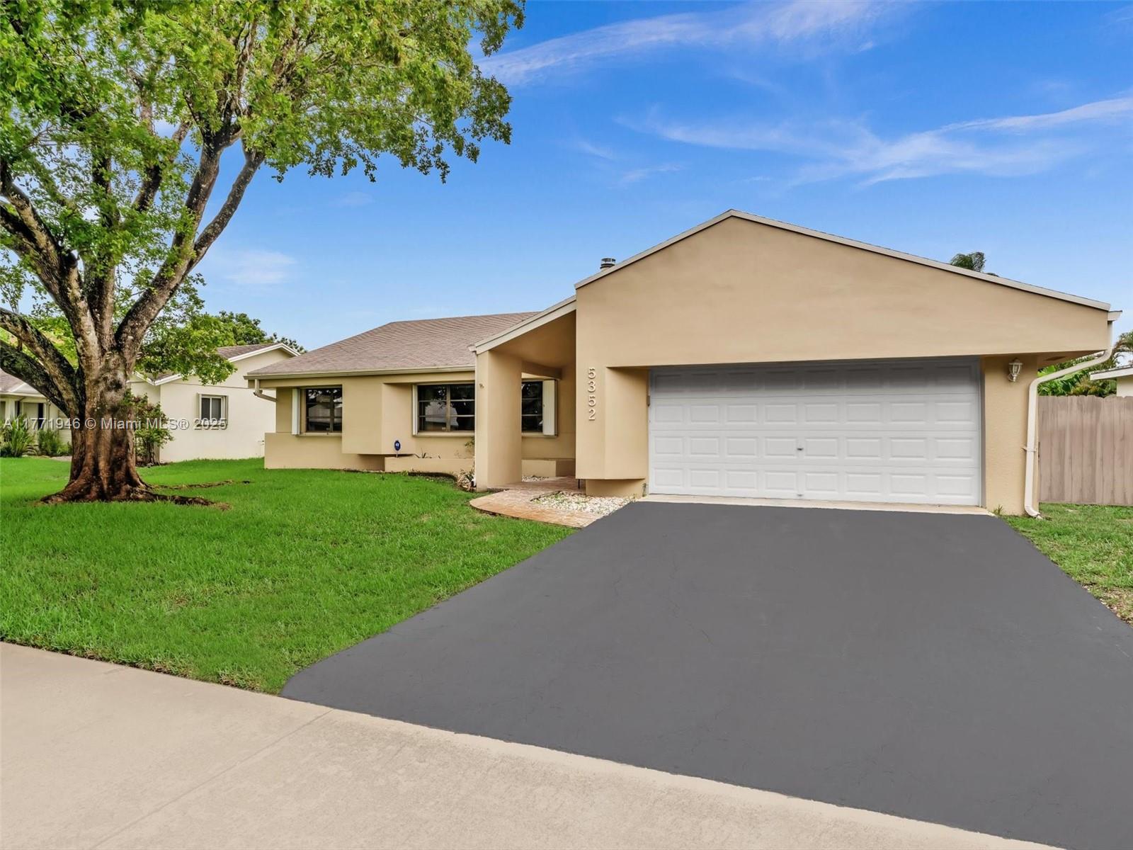 NO HOMEOWNERS FEES !!! SPACIOUS 3/2 with OVERSIZED 2 CAR GARAGE* SPLIT FLOOR PLAN *HOME IN DESIRABLE COOPER CITY *LOCATED IN FAMILY COMMUNITY OF FLAMINGO GARDENS* LARGE ROOMS*VAULTED CEILINGS* FIREPLACE*ALL WOOD KITCHEN CABINETS*PANTRY CABINET*CORIAN COUNTERTOP* SPACIOUS SUN ROOM* ACCORDIAN SHUTERS*HURRICANE RATED GARAGE DOOR 2020* STAINLESS STEEL APPLIANCES & A/C REPLACED 2021*NEW WATER HEATER*NEW IRRIGATION PUMP* HOUSE FRESHLY PAINTED BOTH INSIDE AND OUTSIDE* SECURITY ALARM SYSTEM* WELL SPRINKLER SYSTEM* GREAT LOCATION* WALKING DISTANCE TO GRIFFIN ELEMENTARY AND BILL LIPPS SPORTS PARK* CLOSE TO SHOPPING, CHURCHES, SAWGRASS MALL, PINES MALL, CLOSE TO HOSPITALS, I-75 AND I-595 & SAWGRASS XWAY. EASY TO SHOW. COME SEE TODAY ! SELLER NEGOTIABLE* BRING ALL OFFERS !