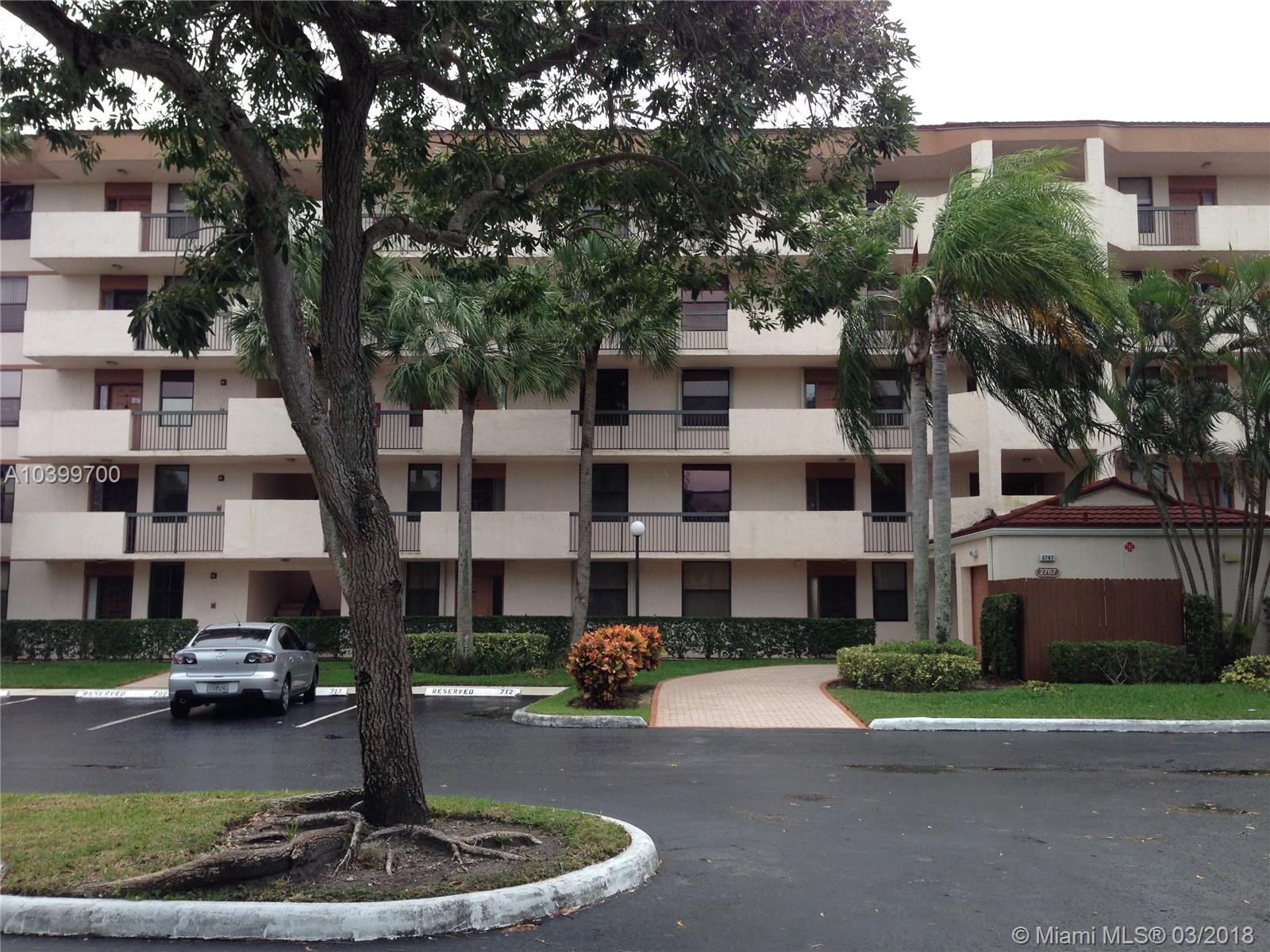 Wide lake view like an extension of this unit on the second floor very sought after community. 2 bedroom 2 bath One open floor plan, porcelain tile updated bath and kitchen, in unit washer and dryer must see. All age