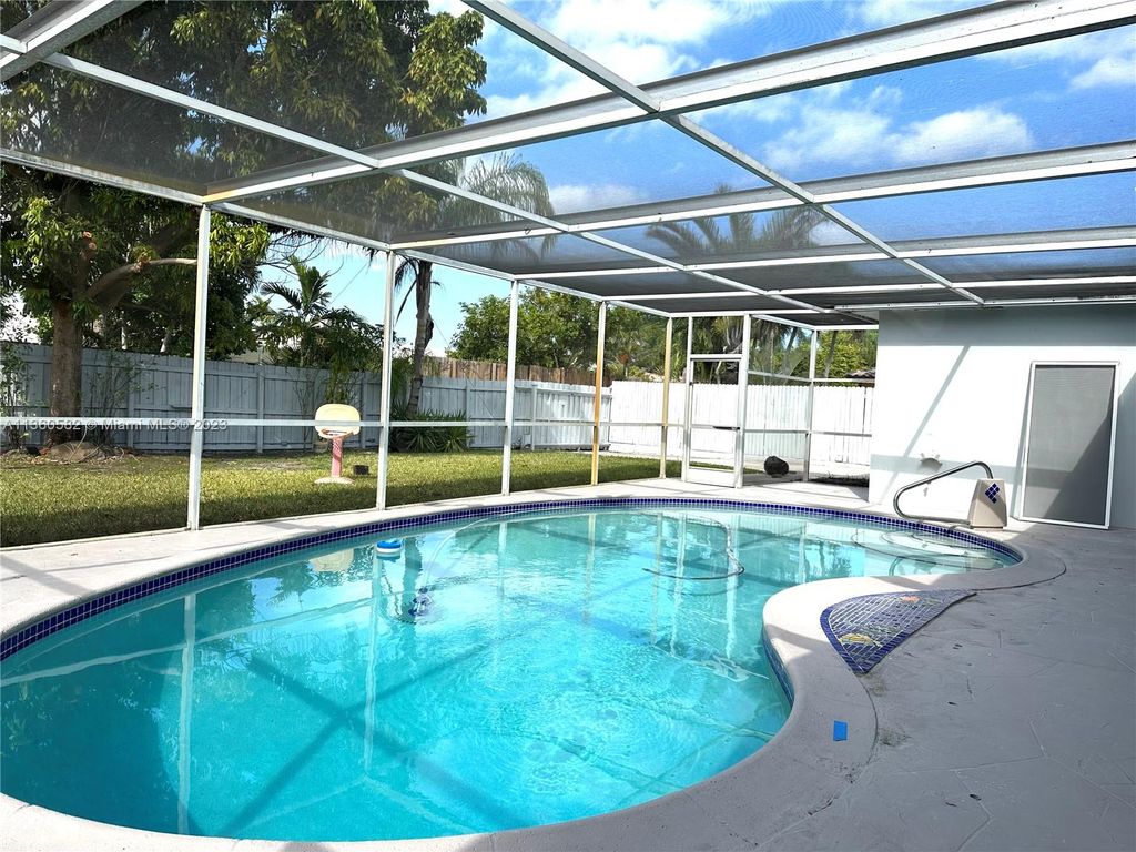 Photo of 4811 Hayes St, Hollywood, FL 33021 (MLS # A11360582)