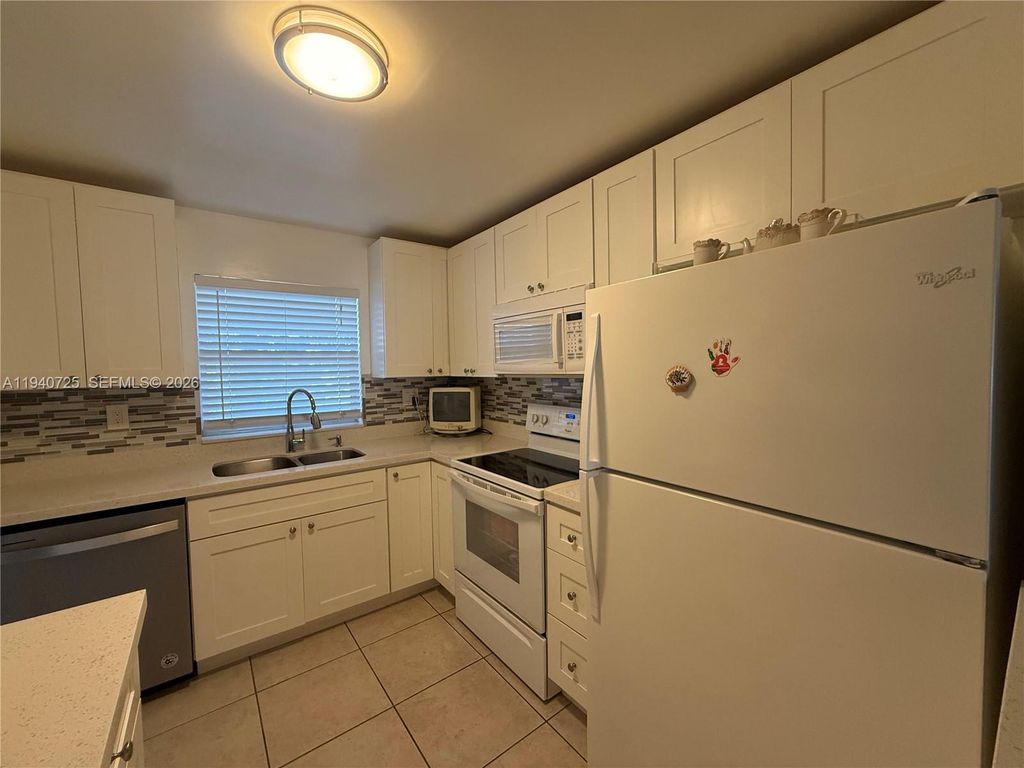 Photo of 9540 Sunrise Lakes Blvd #208, Sunrise, FL 33322 (MLS # A11940725)