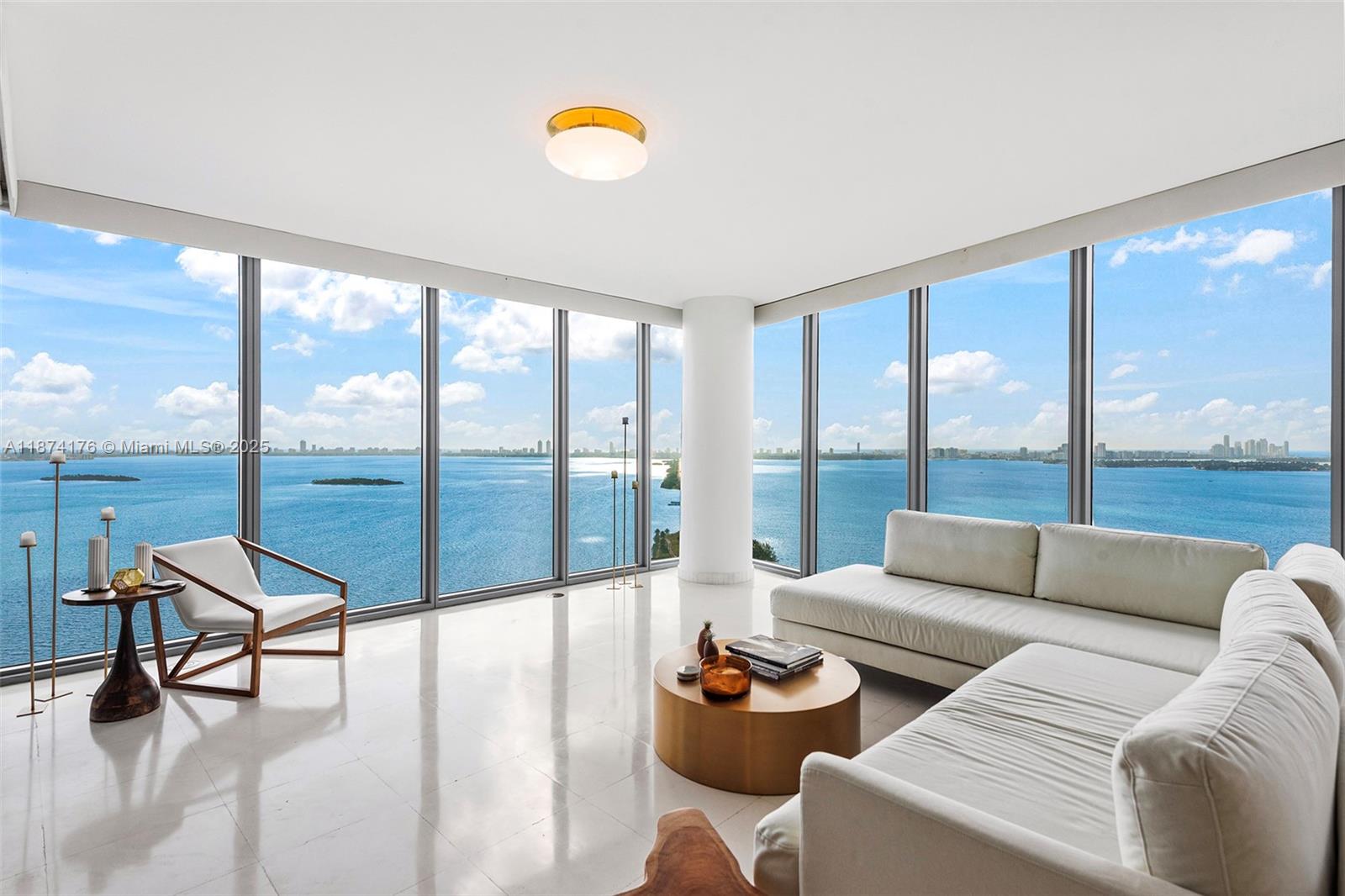 Step into elevated waterfront living with this stunning 2-bedroom, 3-bath waterfront residence located in the heart of Edgewater, just steps from Midtown and Design District. This is the largest non-penthouse unit at Blue Condo, offering panoramic views of Biscayne Bay and Miami Beach through floor-to-ceiling windows in every room. The open-concept layout features a modern kitchen with granite countertops, custom built-in closets, and en-suite bathrooms in both bedrooms. Ideally situated minutes from Miami Design District, Wynwood, Brickell, Miami Beach, and MIA Airport. Building amenities include 24-hour concierge, valet parking, two pools, a fitness center, sauna, barbecue area, movie theater, business center, party room. Resort-style living at its finest!