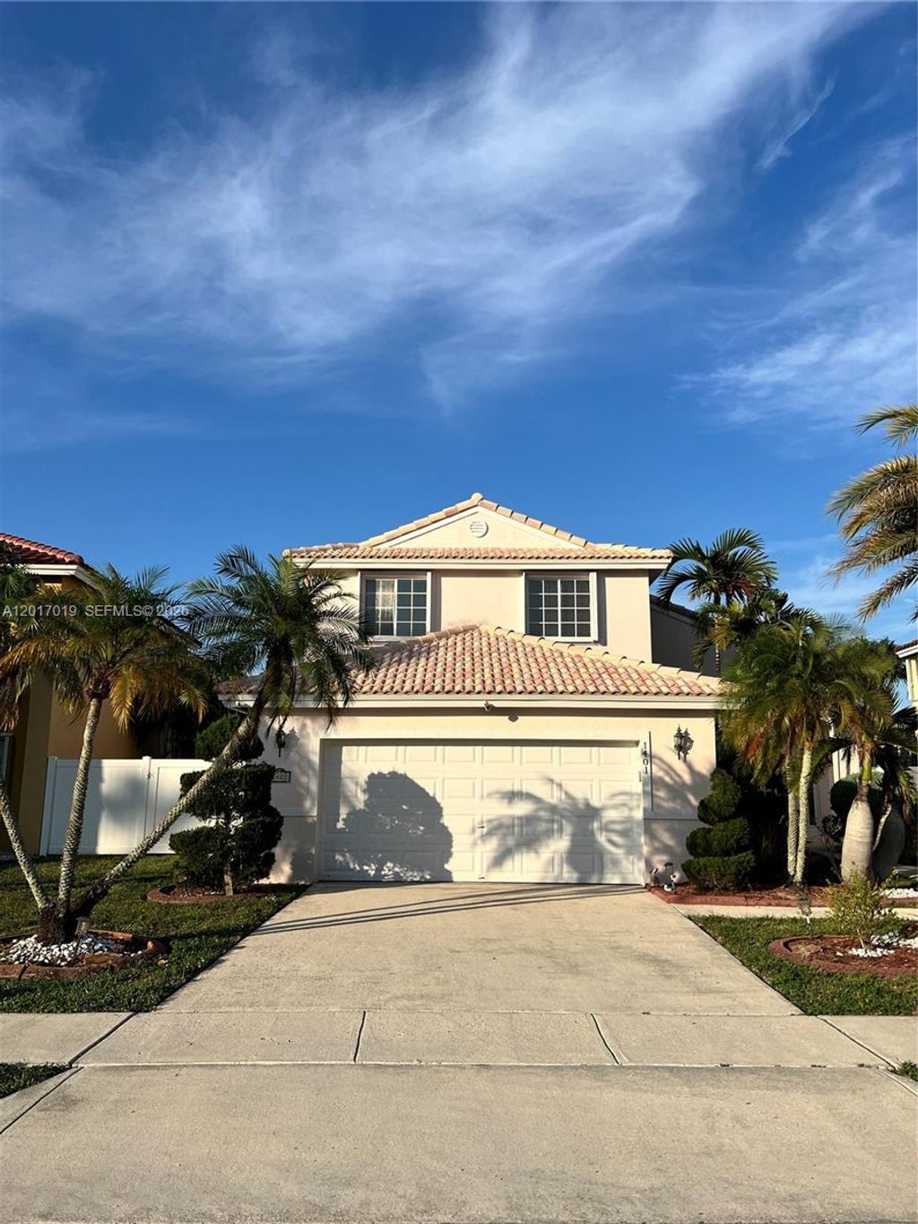 Photo of 1401 NW 187th Ave, Pembroke Pines, FL 33029 (MLS # A12017019)