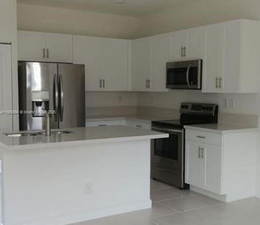 VIA VENTURA BY LENNAR COMMUNITY GREAT LOCATION AND SCHOOL DISTRICT - MINIMALIST DESIGN - GREEN AREAS AND WALKING TRAILS - FAMILYFRIENDLY- WI-FI CERTIFIED HOME-DESIGN - SPACIOUS FLOOR PLANS - A MUST SEE - READY TO MOVE-IN. KITCHEN WITH BRAND NEW STAINLESS-STEEL APPLIANCES - WASHER and DRYER - MODERN KITCHEN CABINETRY INCLUDING QUARTZ COUNTER-TOPS - FENCED PATIO - MODERN BATHROOMS. CONVENIENT ACCESS TO AVENTURA MAIN ATTRACTIONS, RECREATIONS - SHOPPING AND WIDE VARIETY OF FINE FOOD AND DINING OPTIONS. CALL AGENT TO SCHEDULE A VISIT.