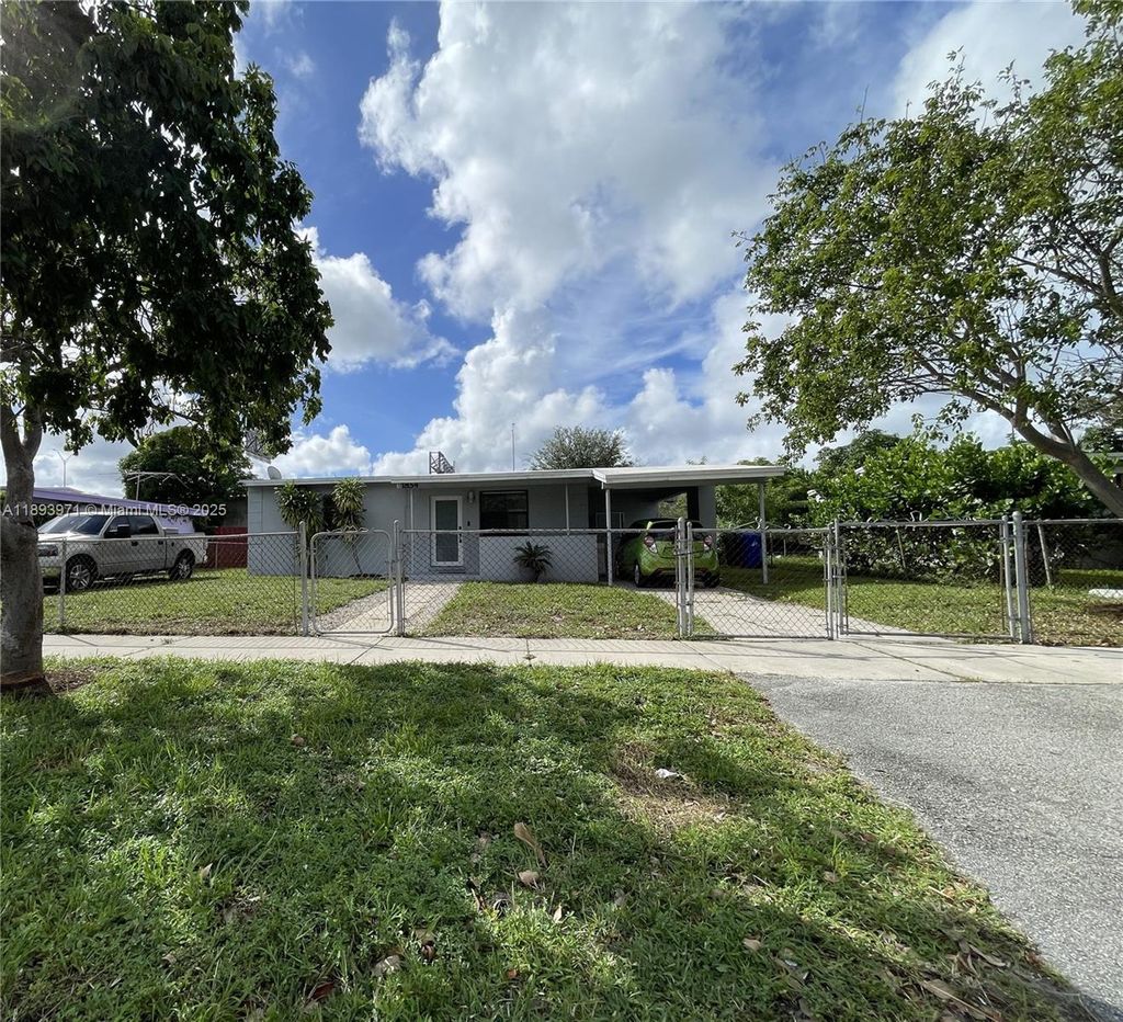 Photo of 1854 Lauderdale Manor Dr, Fort Lauderdale, FL 33311 (MLS # A11893971)