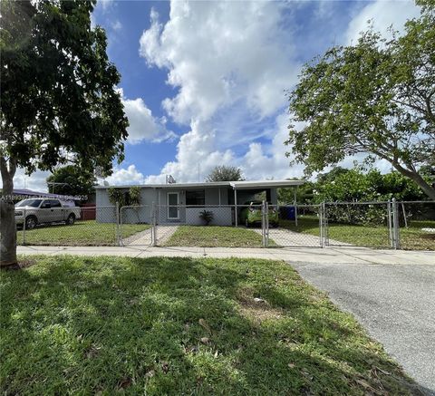 Photo of 1854 Lauderdale Manor Dr, Fort Lauderdale, FL 33311 (MLS # A11893971)