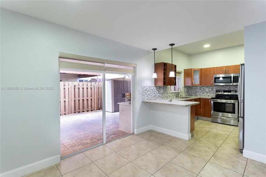 Huge, turnkey townhouse with patio and two parking spaces. The ground floor has a living room and a dining room, a bright and open kitchen with stainless steel appliances, and a fully equipped laundry room. Also, a half bathroom for your convenience. The second floor has a master bedroom with its own master bathroom, and the second bedroom with a full bathroom. The seller designed, created, and customized closets all around the property. Plenty of lights, each room has its own windows and double shades.  New central AC and water heater. Ready to move in. This is a friendly community with a pool,  clubhouse, and security guard on site every night. Perfect for a homestead or investment.