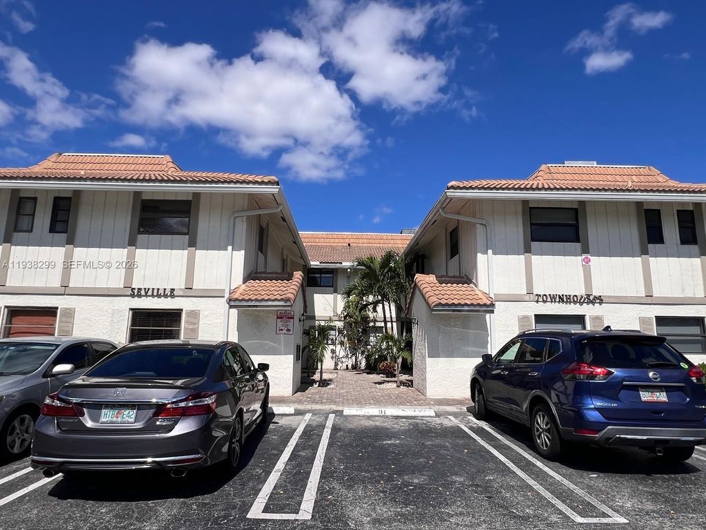 Photo of 10789 Royal Palm Blvd #4, Coral Springs, FL 33065 (MLS # A11938299)
