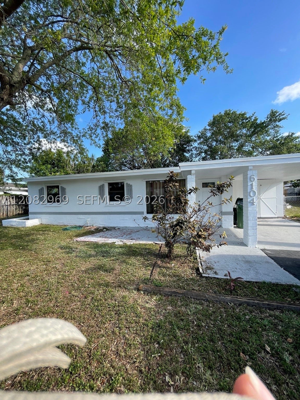 6104 NW 10th St