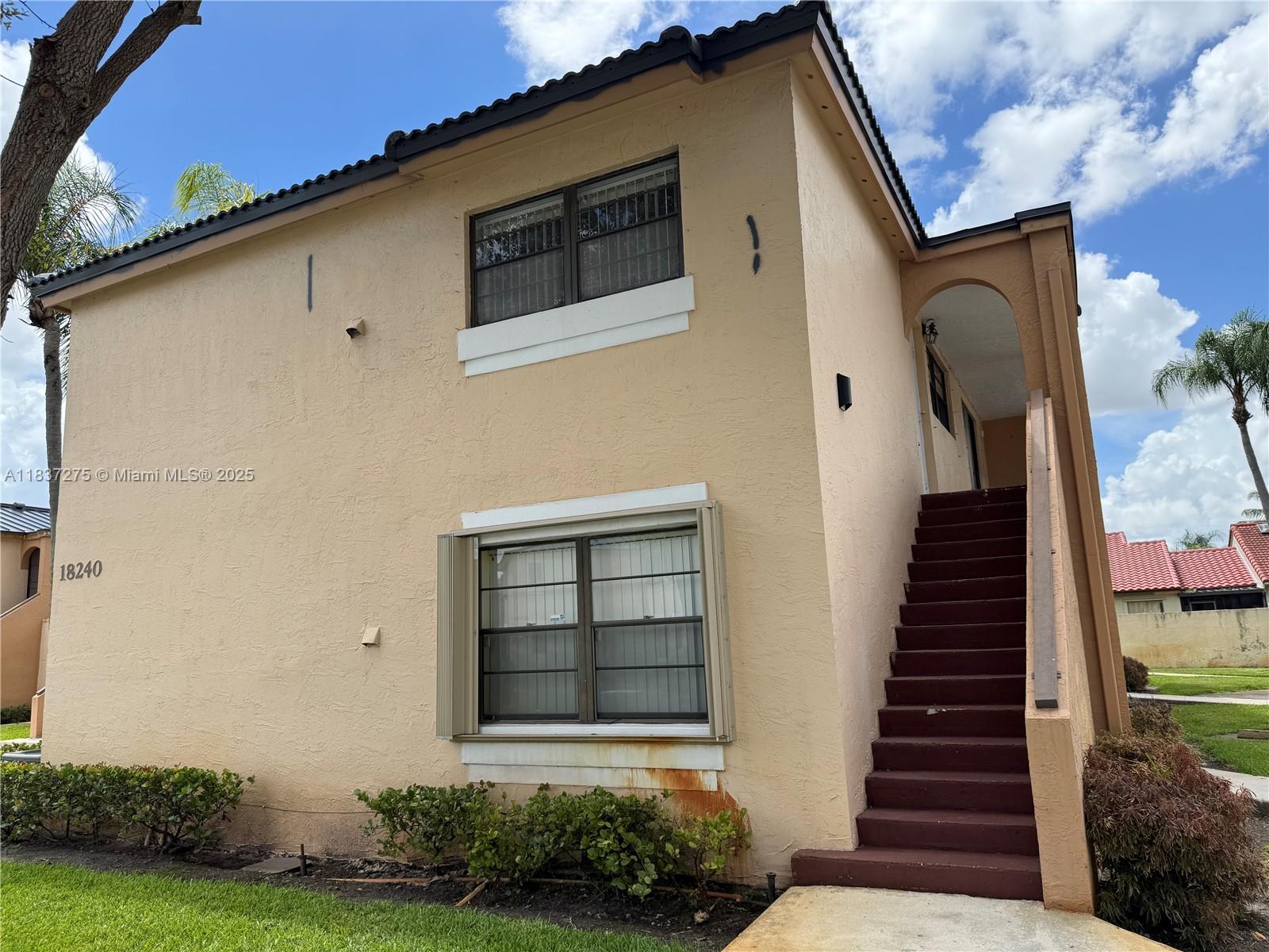 Beautiful second-floor condo located in a gated community with resort-style amenities. This bright and spacious unit offers comfort and privacy in a peaceful setting surrounded by lakes and lush landscaping. Enjoy access to a sparkling swimming pool, tennis courts, clubhouse, and walking paths throughout the community. The serene environment and well-maintained grounds make this the perfect place to relax and unwind. Ideal for year-round living or as a seasonal retreat, this condo offers the best of South Florida living with security, convenience, and style.