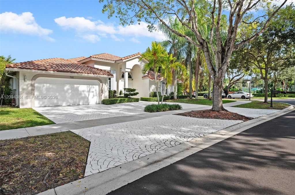 Photo of 765 Bayside Ln, Weston, FL 33326 (MLS # A12004384)