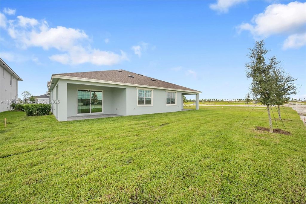 Photo of 19465 Whispering Creek Rd, Loxahatchee, FL 33470 (MLS # A11947971)