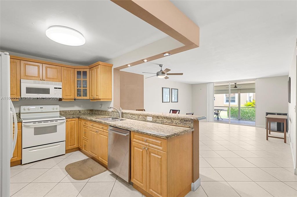 Photo of 424 SE 10th St #104, Dania Beach, FL 33004 (MLS # A11602210)