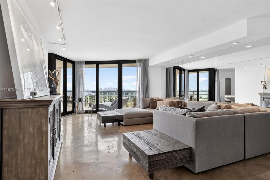 Completely remodeled 1-Bedroom + den, 1.5-bath showcasing breathtaking SE views of Biscayne Bay, Miami skyline, and Miami Beach. This turnkey apartment is offered fully Furnished with custom-made pieces (artwork excluded) and has been meticulously upgraded from top to bottom. Highlights include newly installed impact Storm Windows, custom shades, stained concrete floors, and elegant Venetian plaster walls. The fully renovated kitchen features terrazzo countertops and new appliances. Spa-inspired bathrooms include a soaking tub, while additional upgrades such as a newer A/C system, LED lighting with dimmers throughout, and a custom-designed primary closet ensure both comfort and style. No detail has been overlooked. Simply bring your toothbrush and move right in. The unit also includes Two Parking spaces and has No Assessments. Set within a luxury waterfront community, residents enjoy world-class amenities including a full-service spa, tennis courts, fitness classes, indoor and outdoor pools, marina, on-site restaurants, 24/7 security, high-speed internet, and cable — all included in the maintenance fees. A must-see and Easy to Show!