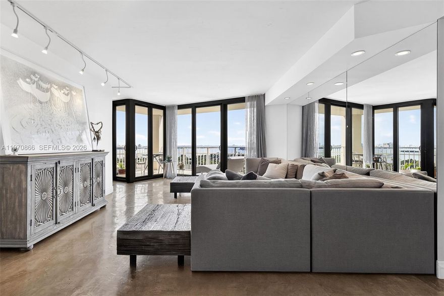 Completely remodeled 1-Bedroom + den, 1.5-bath showcasing breathtaking SE views of Biscayne Bay, Miami skyline, and Miami Beach. This turnkey apartment is offered fully Furnished with custom-made pieces (artwork excluded) and has been meticulously upgraded from top to bottom. Highlights include newly installed impact Storm Windows, custom shades, stained concrete floors, and elegant Venetian plaster walls. The fully renovated kitchen features terrazzo countertops and new appliances. Spa-inspired bathrooms include a soaking tub, while additional upgrades such as a newer A/C system, LED lighting with dimmers throughout, and a custom-designed primary closet ensure both comfort and style. No detail has been overlooked. Simply bring your toothbrush and move right in. The unit also includes Two Parking spaces and has No Assessments. Set within a luxury waterfront community, residents enjoy world-class amenities including a full-service spa, tennis courts, fitness classes, indoor and outdoor pools, marina, on-site restaurants, 24/7 security, high-speed internet, and cable — all included in the maintenance fees. A must-see and Easy to Show!