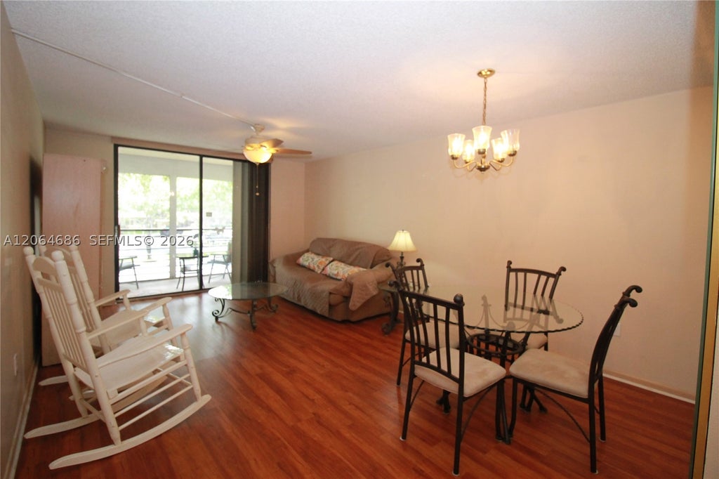 Photo of 900 Colony Point Cir #216, Pembroke Pines, FL 33026 (MLS # A12064686)