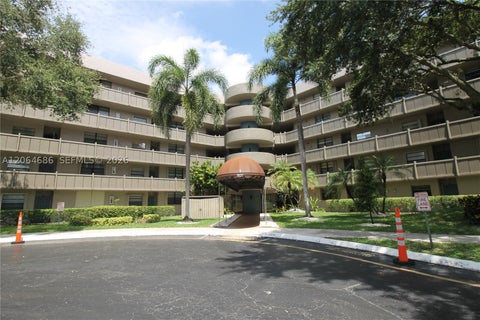 Photo of 900 Colony Point Cir #216, Pembroke Pines, FL 33026 (MLS # A12064686)