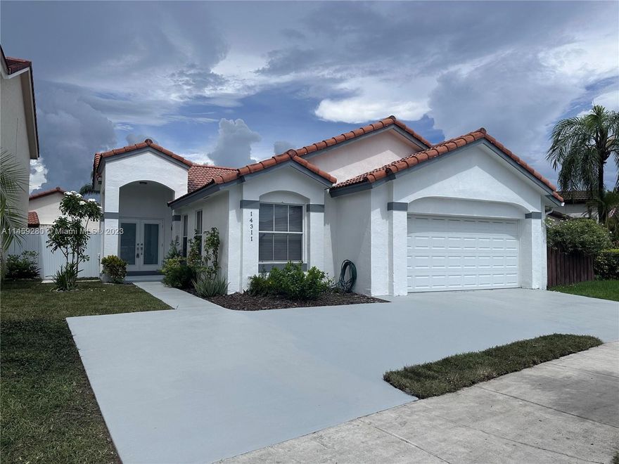 South Kendall, Near the Hammocks lies a spacious, cozy and beautiful property waiting to make it yours. This spacious and comfortable home has 3 bedrooms, 2 bathrooms, double car garage with additional parking upfront, living, family and dining room, kitchen, beautiful and well maintained patio terrace. NO HOA - NO APPROVAL NEEDED. Centrally located to shopping, dining, and expressway. Walking distance to elementary school. Available shutters for your client to use during a hurricane. This property is located in a very quiet neighborhood that is fit for any family. Landlord is motivated, so hurry it will not last!!!!!