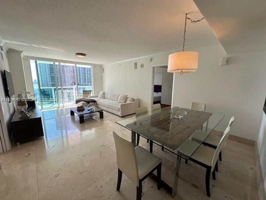 FURNISHED WATER VIEW 2/2 Apt with amazing river, bay and pools view in the heart of Brickell. European kitchen with granite countertop, Stainless Steel appliances, washer & dryer inside the unit. Amenities include a 2-story gym, Jacuzzi, sauna, steam room, business center, party room, bar, pool, BBQ area, 24 hr. valet parking and concierge. Walking distance to Financial District, Downtown, Brickell City Center, restaurants and shops. 1 Assigned parking spot, 24/7 security, next to 5th station metro mover station. 
Available August 1/2025