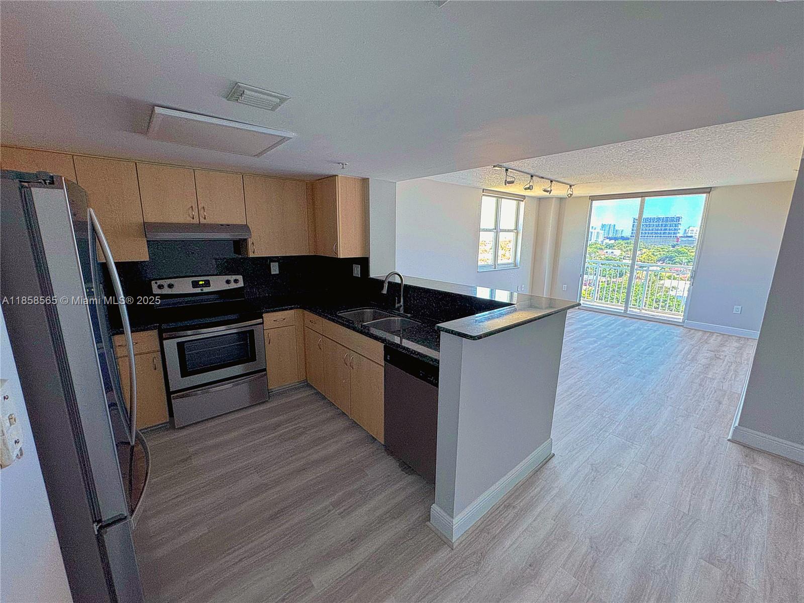 LOCATION & VIEWS! Fully renovated 2-bed, 2-bath corner unit at The Aston with breathtaking Miami skyline views. Features brand-new waterproof Luxury Vinyl Plank floors, remodeled bathrooms with DuraBath Wall Surrounds, and a modern kitchen with stainless steel appliances. Spacious primary suite includes walk-in closet, upgraded soaking tub, and new in-unit washer/dryer. Amenities: 24/7 concierge, on-site management, heated pool, fitness center, BBQ area, covered & guest parking. Rent includes Google Webpass internet, water, sewer, trash, and pest control. Prime Coral Way location — walk to Miracle Mile shops, dining, and supermarkets; minutes to Brickell, Coconut Grove, Downtown, Key Biscayne, and Miami Airport. Pet-friendly. Rapid approval. Move-in ready!