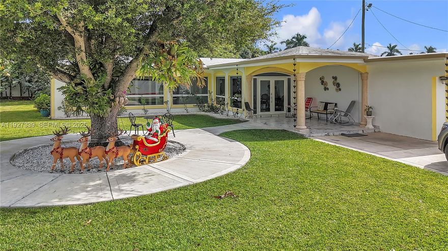 Discover this exceptional 5-bedroom, 5-bath estate located in highly desirable South Dade. Set on a beautifully maintained lot, this residence offers impact windows and doors, electric garage doors, and comprehensive security with an electric perimeter fence, automatic gate, and full aluminum fencing around the property. Enjoy added peace of mind with 3 new A/C units, 2 septic tanks, a full sprinkler system, and a whole-home water filtration system.


The outdoor spaces are truly impressive, featuring a covered terrace, electric front-porch shades, abundant yard space ideal for entertaining, and more than 23 mature fruit trees. A separate guest house provides flexible living options and includes its own office, making it perfect for work, visitors, or extended stays.