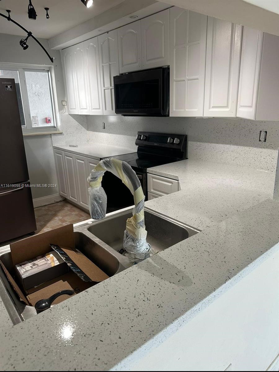 VISTA DEL LAGO I CONDO - Residential