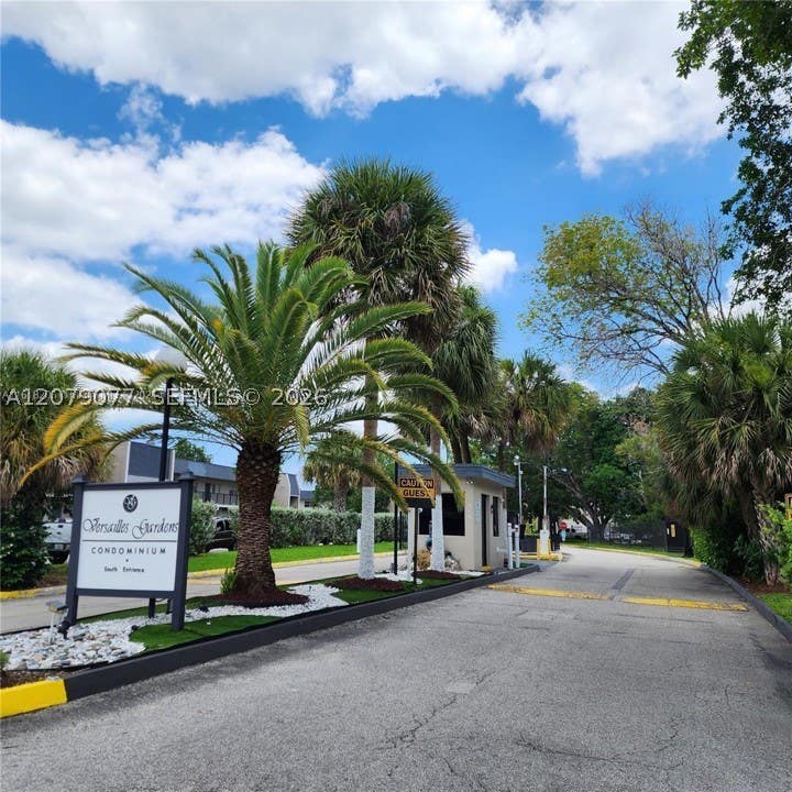 Photo of 8020 N Colony Cir N #202, Tamarac, FL 33321 (MLS # A12079077)