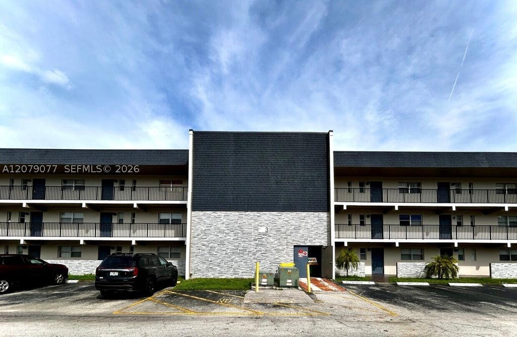Photo of 8020 N Colony Cir N #202, Tamarac, FL 33321 (MLS # A12079077)