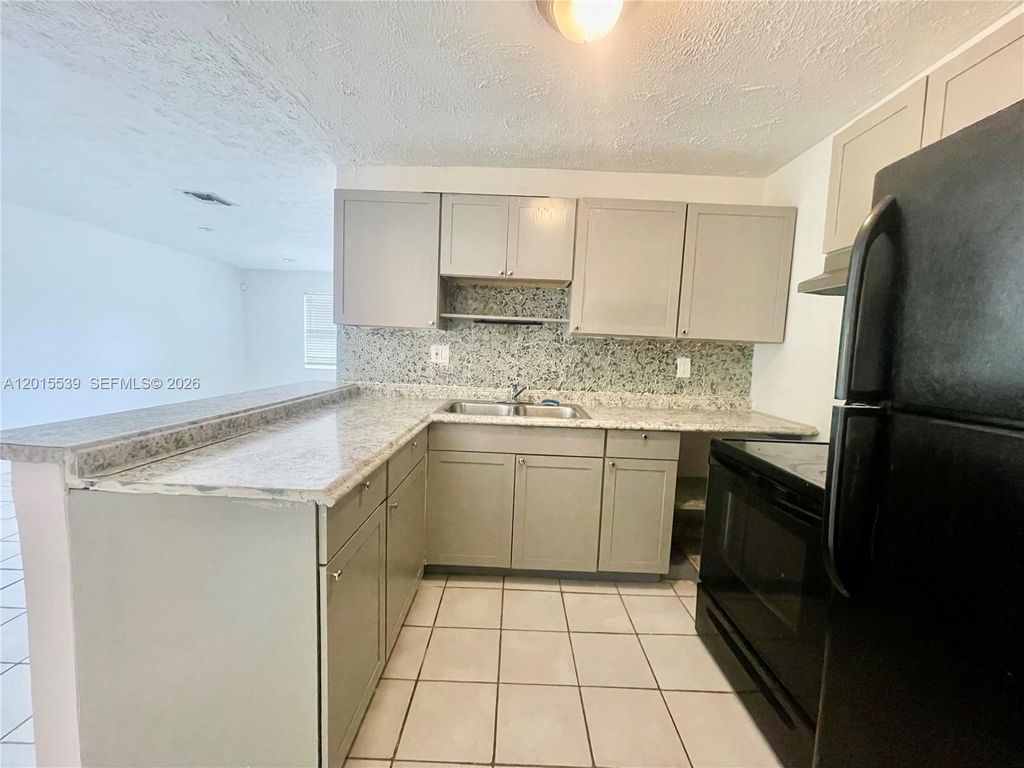 Photo of 2621 Riverland Dr #2, Fort Lauderdale, FL 33312 (MLS # A12015539)