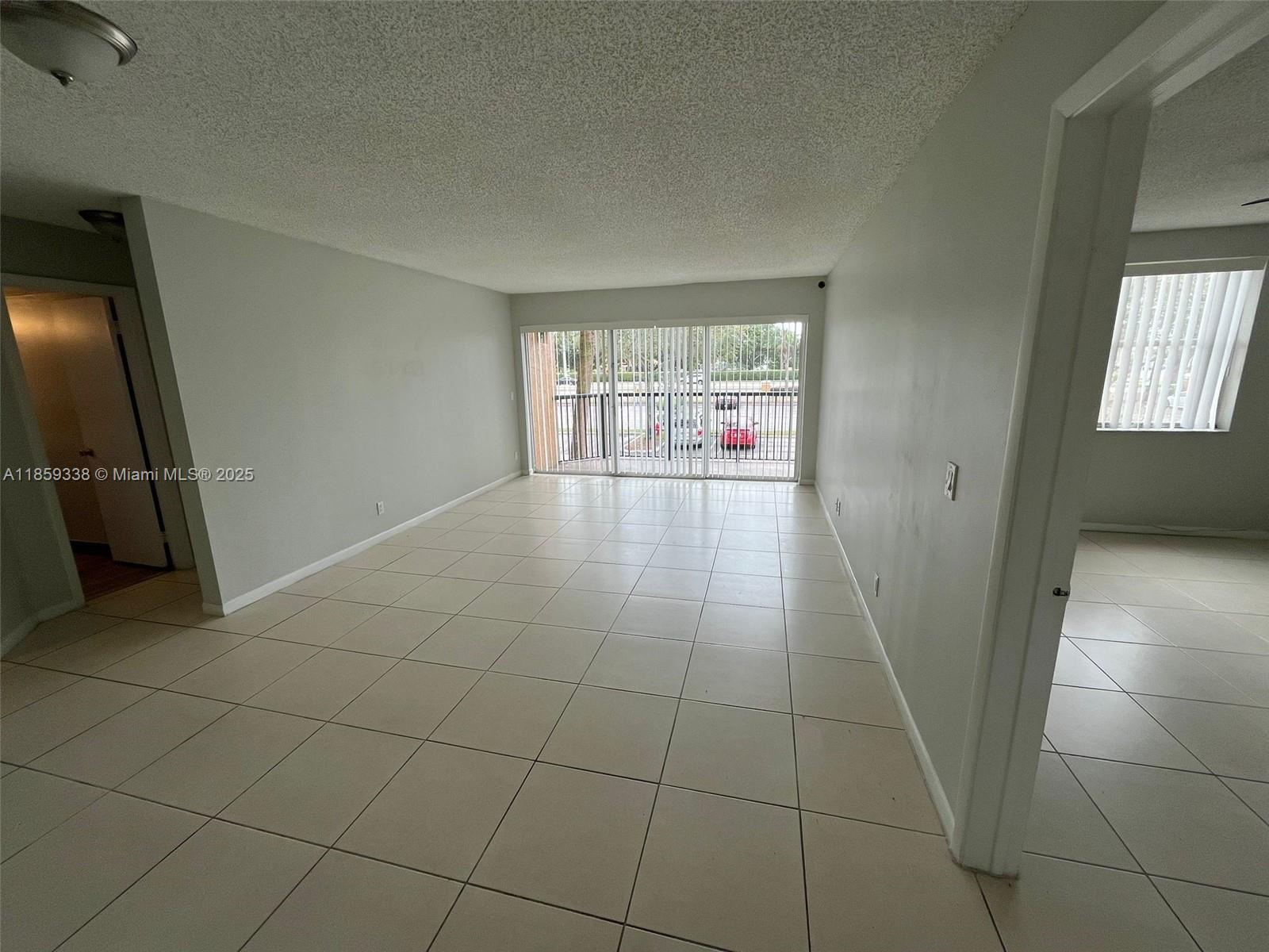 8821 Wiles Rd 203